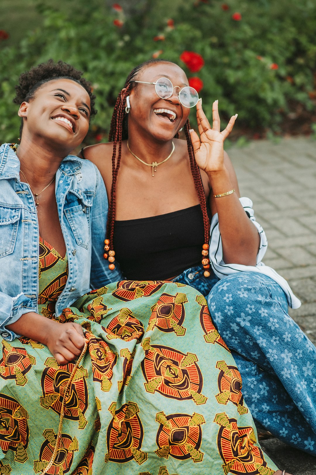 a-couple-of-women-sitting-next-to-each-other-lufsd68c-a8